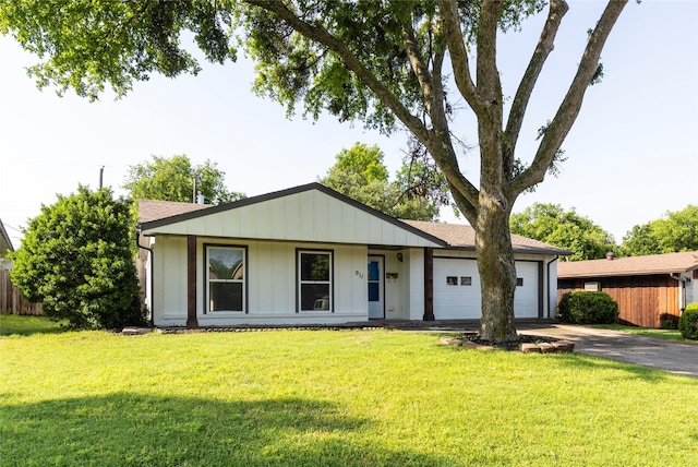 911 Prestwick Ln, Richardson, TX 75080 - ranch-style house with a garage, a front lawn, and driveway