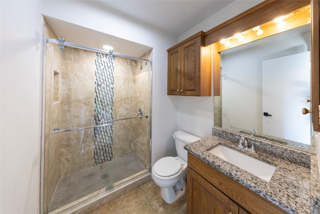 911 Prestwick Ln, Richardson, TX 75080 - bathroom with a stall shower, toilet, tile patterned flooring, and vanity