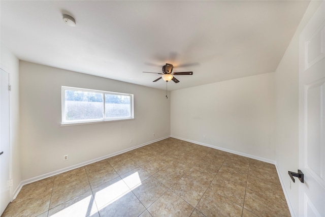 911 Prestwick Ln, Richardson, TX 75080 - empty room featuring baseboards, light tile patterned floors, and ceiling fan