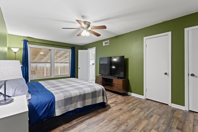 1701 W Birge St, Sherman, TX 75092 - bedroom with wood finished floors, baseboards, and ceiling fan