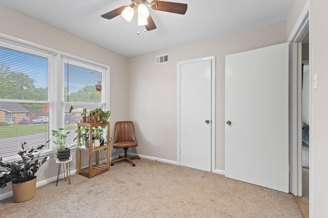 1701 W Birge St, Sherman, TX 75092 - living area featuring carpet floors, ceiling fan, and baseboards