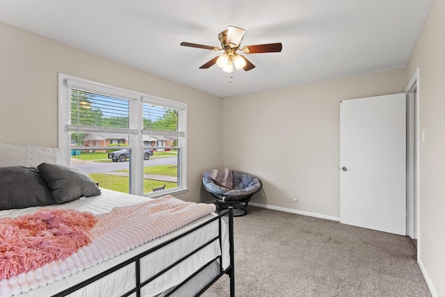 1701 W Birge St, Sherman, TX 75092 - carpeted bedroom featuring baseboards and a ceiling fan