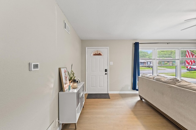 1701 W Birge St, Sherman, TX 75092 - foyer with light wood-style flooring and baseboards