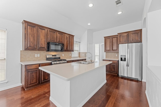 1716 Yarmouth Ln, Mansfield, TX 76063 - kitchen featuring dark wood-style floors, a sink, stainless steel appliances, and light countertops