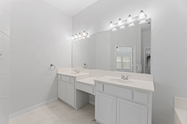 1716 Yarmouth Ln, Mansfield, TX 76063 - bathroom featuring a ceiling fan, marble finish floor, double vanity, and a sink