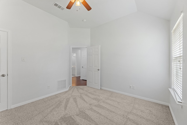 1716 Yarmouth Ln, Mansfield, TX 76063 - unfurnished bedroom featuring multiple windows, visible vents, vaulted ceiling, and carpet