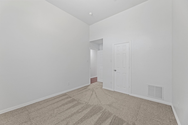 1716 Yarmouth Ln, Mansfield, TX 76063 - spare room with baseboards, visible vents, carpet floors, and high vaulted ceiling