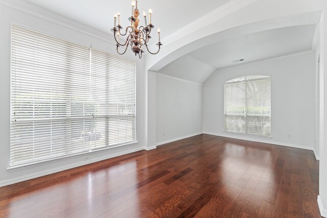 1716 Yarmouth Ln, Mansfield, TX 76063 - unfurnished dining area featuring a notable chandelier, visible vents, baseboards, arched walkways, and hardwood / wood-style floors