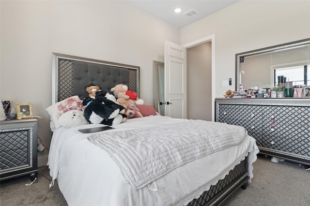 bedroom featuring visible vents and carpet