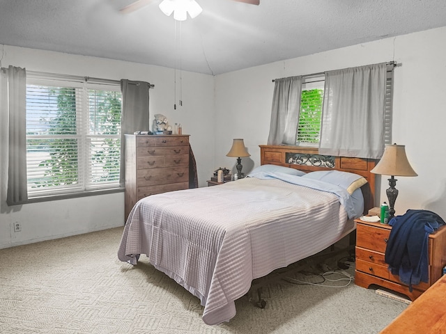 bedroom with carpet flooring and ceiling fan