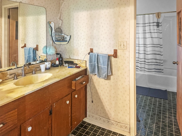 full bathroom featuring vanity, tile patterned floors, shower / bath combo, and wallpapered walls