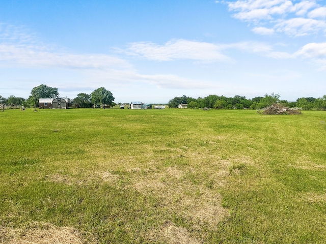 view of landscape with a rural view