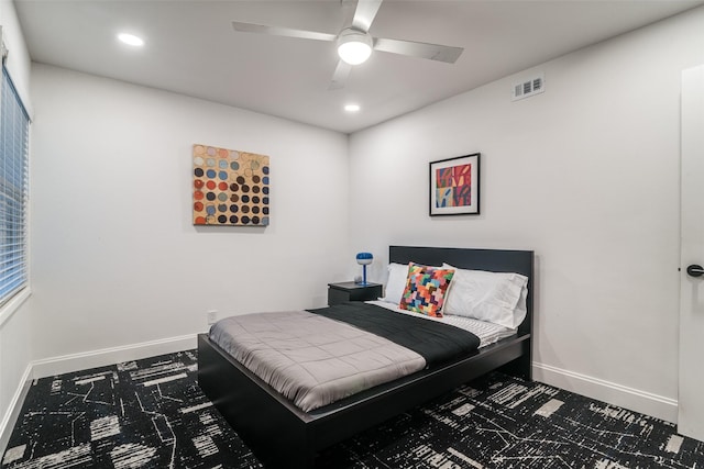 bedroom featuring recessed lighting, a ceiling fan, visible vents, and baseboards