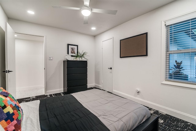 bedroom with recessed lighting, ceiling fan, and baseboards