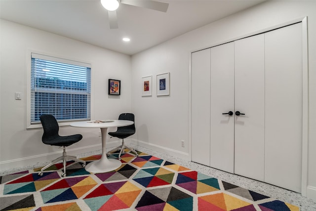 office featuring recessed lighting, ceiling fan, speckled floor, and baseboards