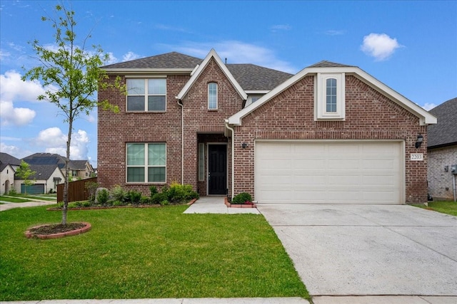 2203 Lannister St, Mansfield, TX 76063 - traditional home featuring a shingled roof, driveway, a front lawn, and brick siding