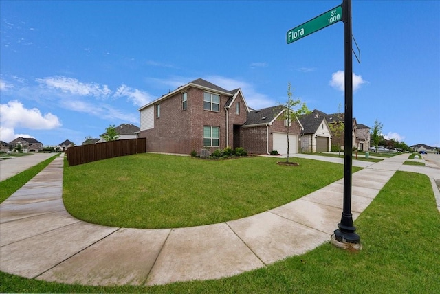 2203 Lannister St, Mansfield, TX 76063 - view of side of property featuring a residential view, brick siding, fence, a yard, and concrete driveway