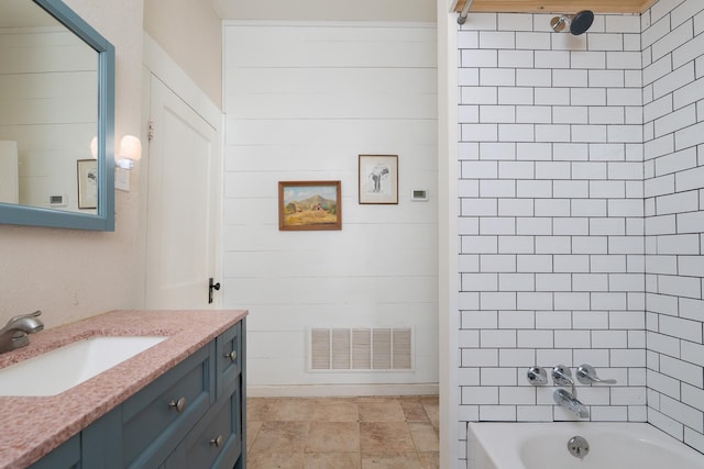 bathroom featuring shower / washtub combination, visible vents, and vanity
