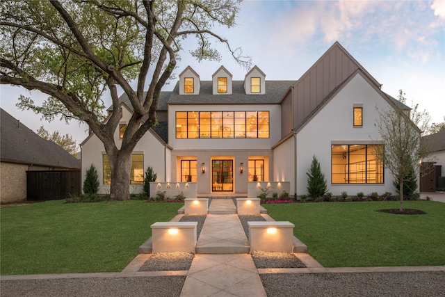 6814 Glendora Ave, Dallas, TX 75230 - view of front of house with stucco siding and board and batten siding