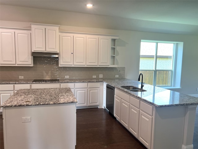 39 Magpie, Joshua, TX 76058 - kitchen featuring dishwasher, open shelves, a peninsula, under cabinet range hood, and black electric stovetop