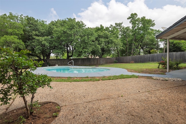 view of swimming pool featuring a fenced in pool, a fenced backyard, and a patio area