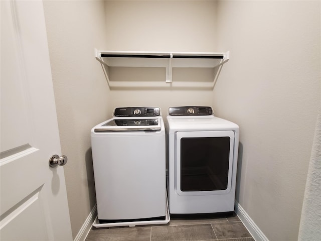 6246 Rilla St, Frisco, TX 75035 - clothes washing area with washing machine and clothes dryer, laundry area, and baseboards