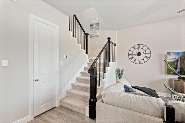 6246 Rilla St, Frisco, TX 75035 - living area featuring baseboards, stairway, and light wood finished floors