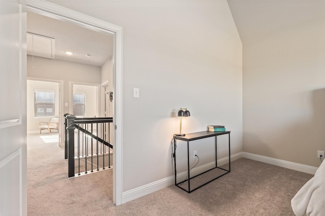 6246 Rilla St, Frisco, TX 75035 - corridor featuring attic access, carpet flooring, an upstairs landing, baseboards, and lofted ceiling