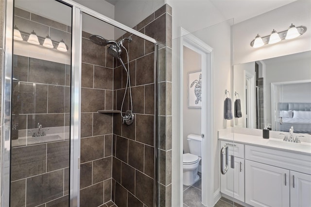 6246 Rilla St, Frisco, TX 75035 - full bathroom with tile patterned floors, toilet, vanity, and a shower stall