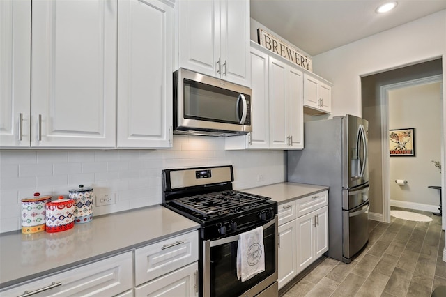 6246 Rilla St, Frisco, TX 75035 - kitchen with baseboards, white cabinetry, stainless steel appliances, and tasteful backsplash