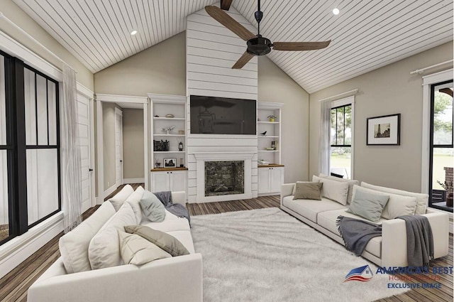 living room featuring wood ceiling, recessed lighting, a fireplace, wood finished floors, and a ceiling fan