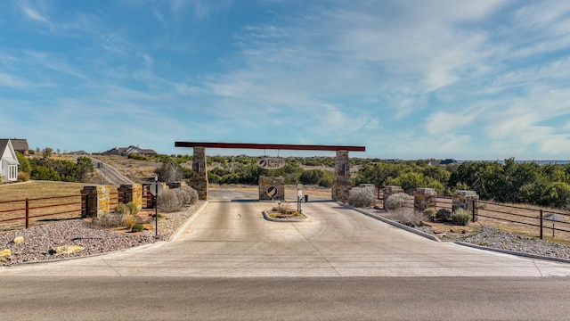 view of property's community with fence