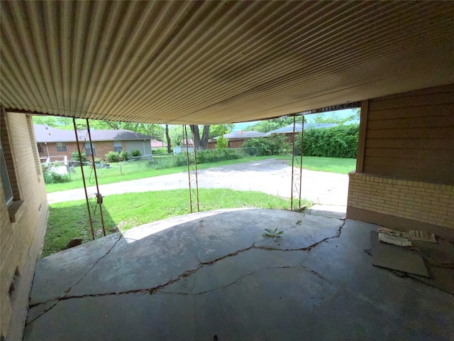 view of patio / terrace featuring fence