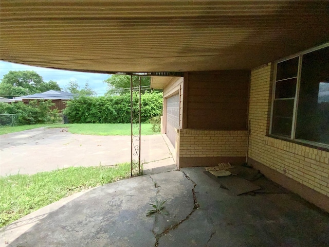 view of patio / terrace with a garage
