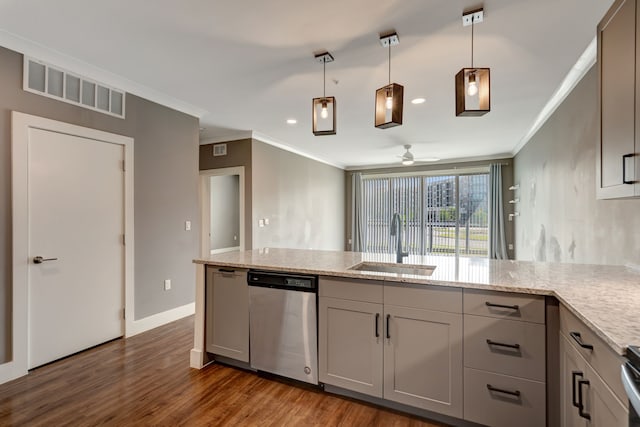 kitchen featuring a sink, dishwasher, ornamental molding, and visible vents