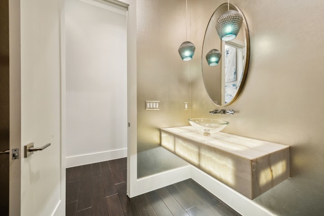 816 Rhone Ln, Southlake, TX 76092 - bathroom with a sink, baseboards, and wood finished floors