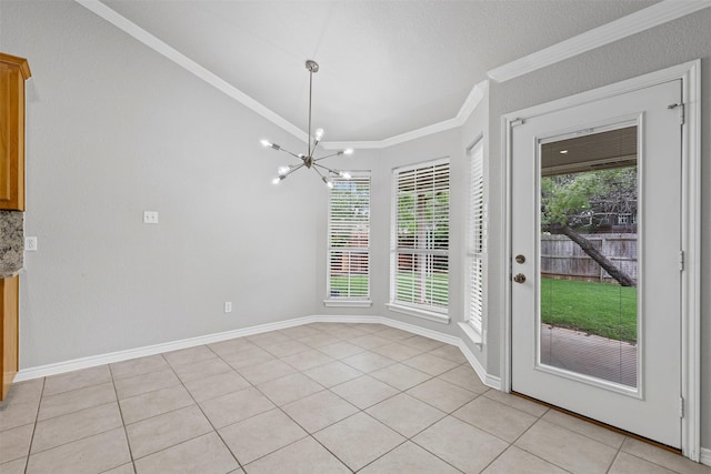 unfurnished dining area featuring baseboards, ornamental molding, light tile patterned floors, and a notable chandelier