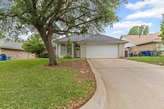 single story home with a shingled roof, stone siding, a garage, a front yard, and driveway