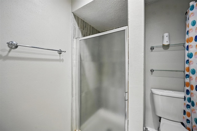 full bath with a shower stall and toilet