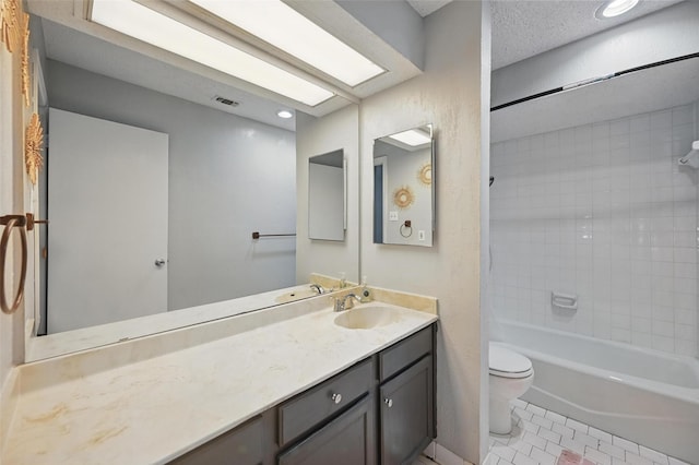 full bath featuring bathtub / shower combination, tile patterned floors, toilet, vanity, and visible vents
