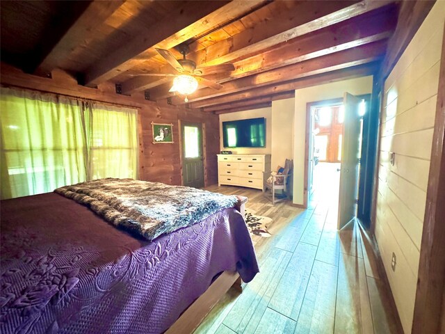 11300 Massey Rd, Pilot Point, TX 76258 - bedroom with hardwood / wood-style flooring and beam ceiling