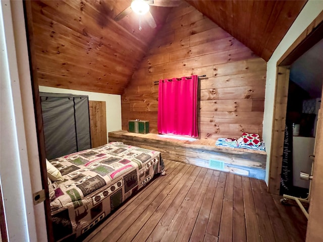 11300 Massey Rd, Pilot Point, TX 76258 - bedroom featuring vaulted ceiling, wooden ceiling, wood walls, and hardwood / wood-style floors