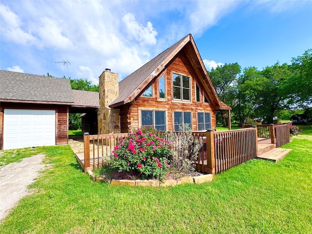 11300 Massey Rd, Pilot Point, TX 76258 - back of property featuring dirt driveway, a chimney, an attached garage, a lawn, and a wooden deck