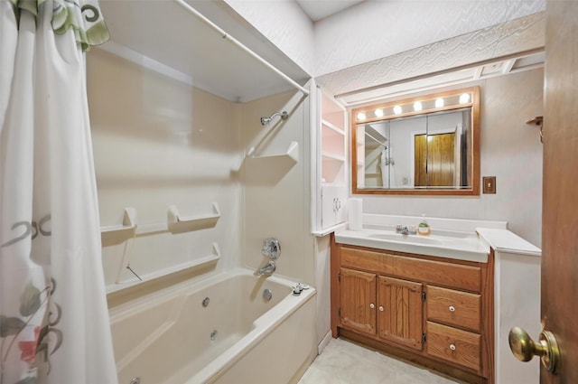 bathroom featuring shower / tub combo with curtain and vanity
