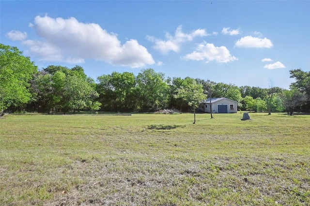 view of yard with a rural view