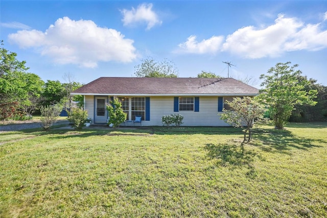 ranch-style house with a front lawn