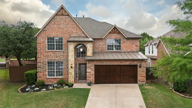 4953 Van Zandt Dr, Fort Worth, TX 76244 - traditional-style home with a standing seam roof, a front lawn, a garage, driveway, and fence