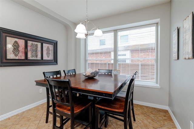 4953 Van Zandt Dr, Fort Worth, TX 76244 - dining space with a wealth of natural light, a chandelier, light tile patterned floors, and baseboards