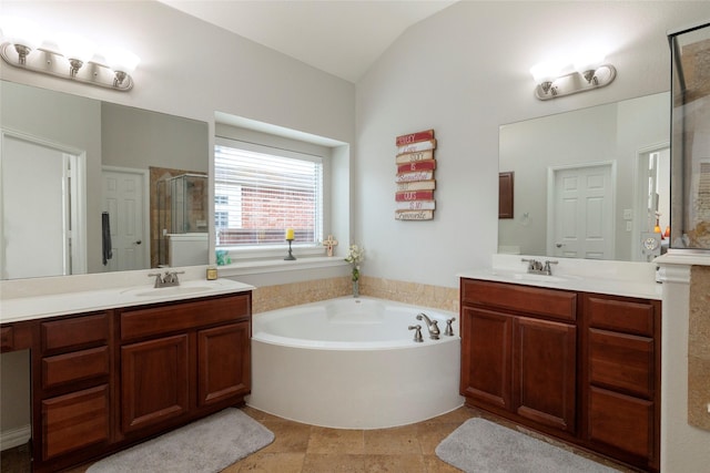 4953 Van Zandt Dr, Fort Worth, TX 76244 - bathroom with vaulted ceiling, a shower stall, a bath, and a sink
