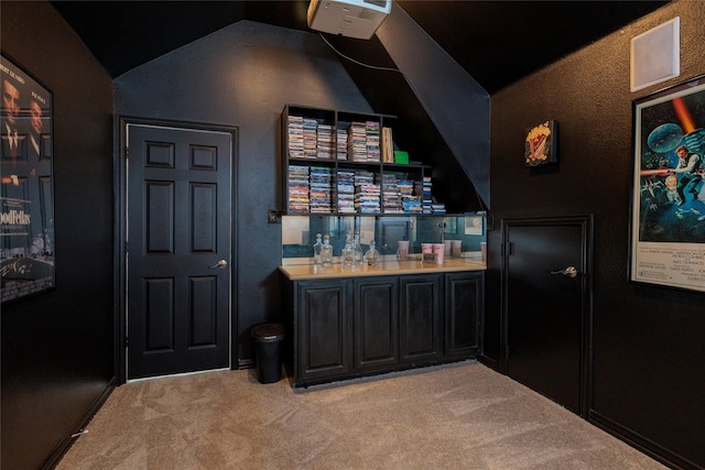 4953 Van Zandt Dr, Fort Worth, TX 76244 - bar featuring a dry bar, vaulted ceiling, and light colored carpet